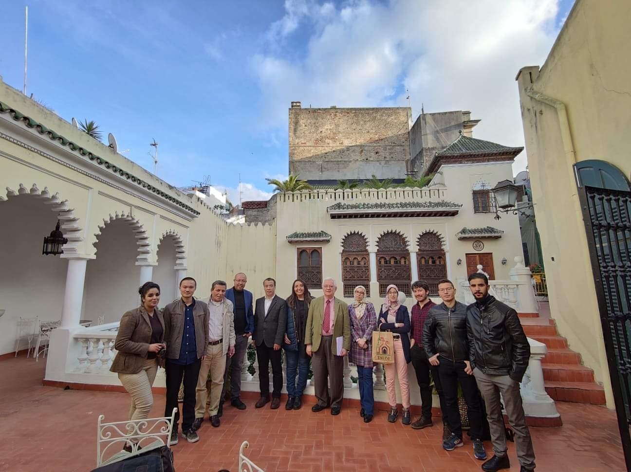 Dale Eickelman ’64, center, poses with Moroccan sociologist Fadma Ait Mous, left, and Moroccan, Chinese, and American participants in a pre-doctoral workshop at the Tangier American Legation Institute for Moroccan Studies in February 2020. (Photo by Ayoub Lahlou)